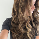 Bronzed Caramel 24-inch wavy wig in brunette caramel balayage, side view showing the hairline