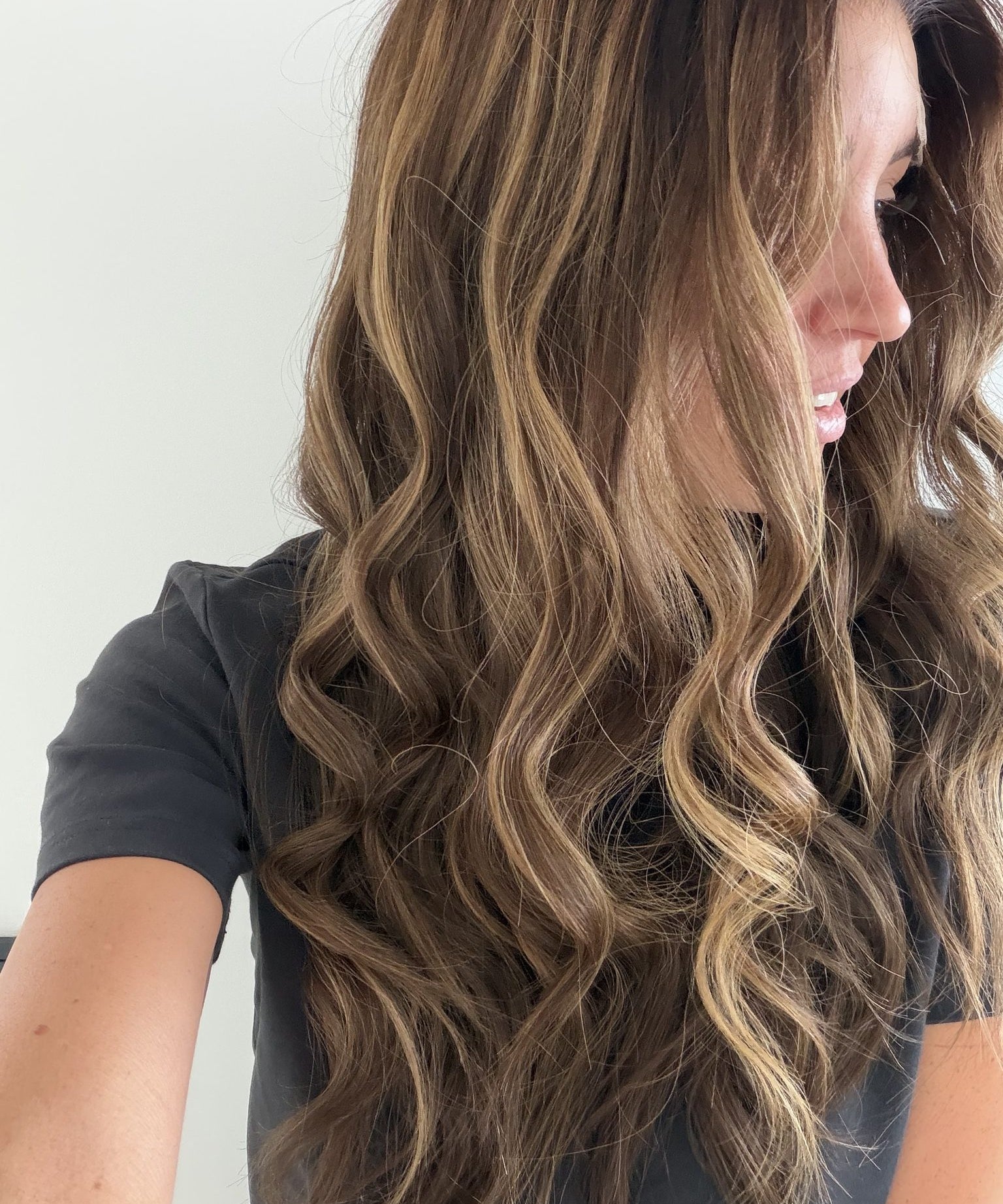 Bronzed Caramel 24-inch wavy wig in brunette caramel balayage, side view showing the hairline
