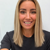 Champagne Melt 16-inch straight wig in rooted champagne blonde balayage, front view