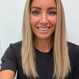 Champagne Melt 18-inch straight wig in rooted champagne blonde balayage, front view