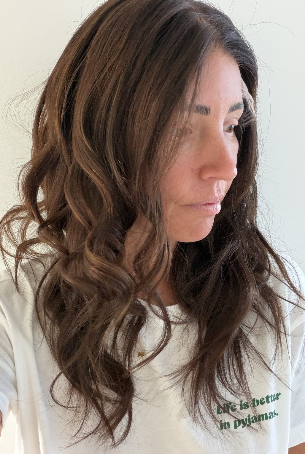 Cinnamon Spice 18-inch wavy wig in warm chocolate brown, side view showing the hairline