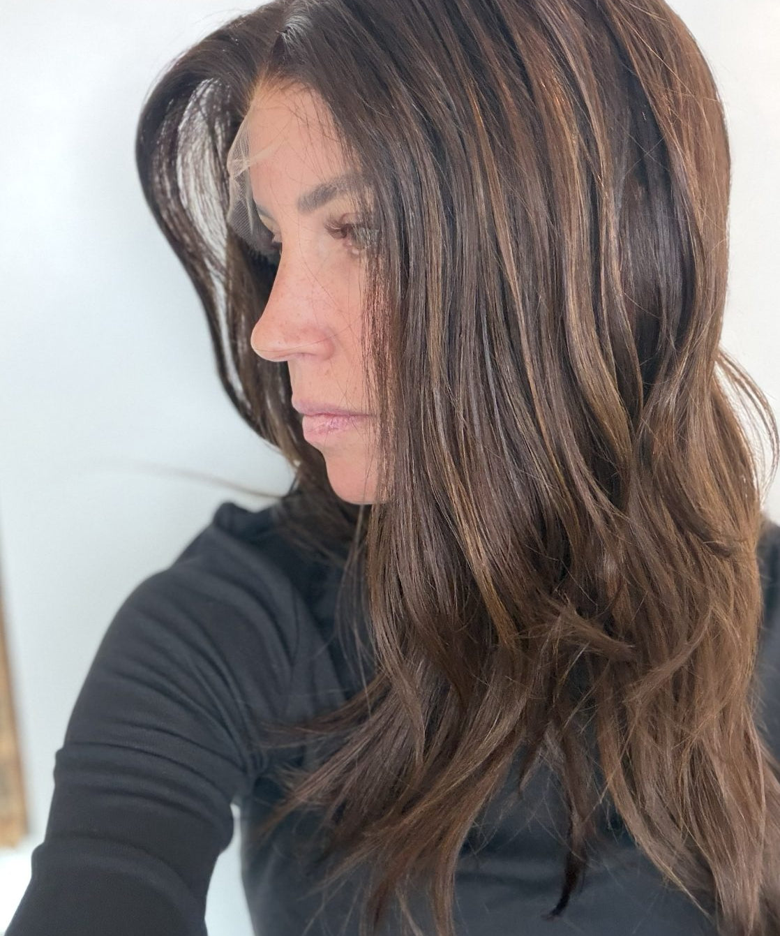 Cinnamon Spice 20-inch wavy wig in warm chocolate brown, side view showing the hairline