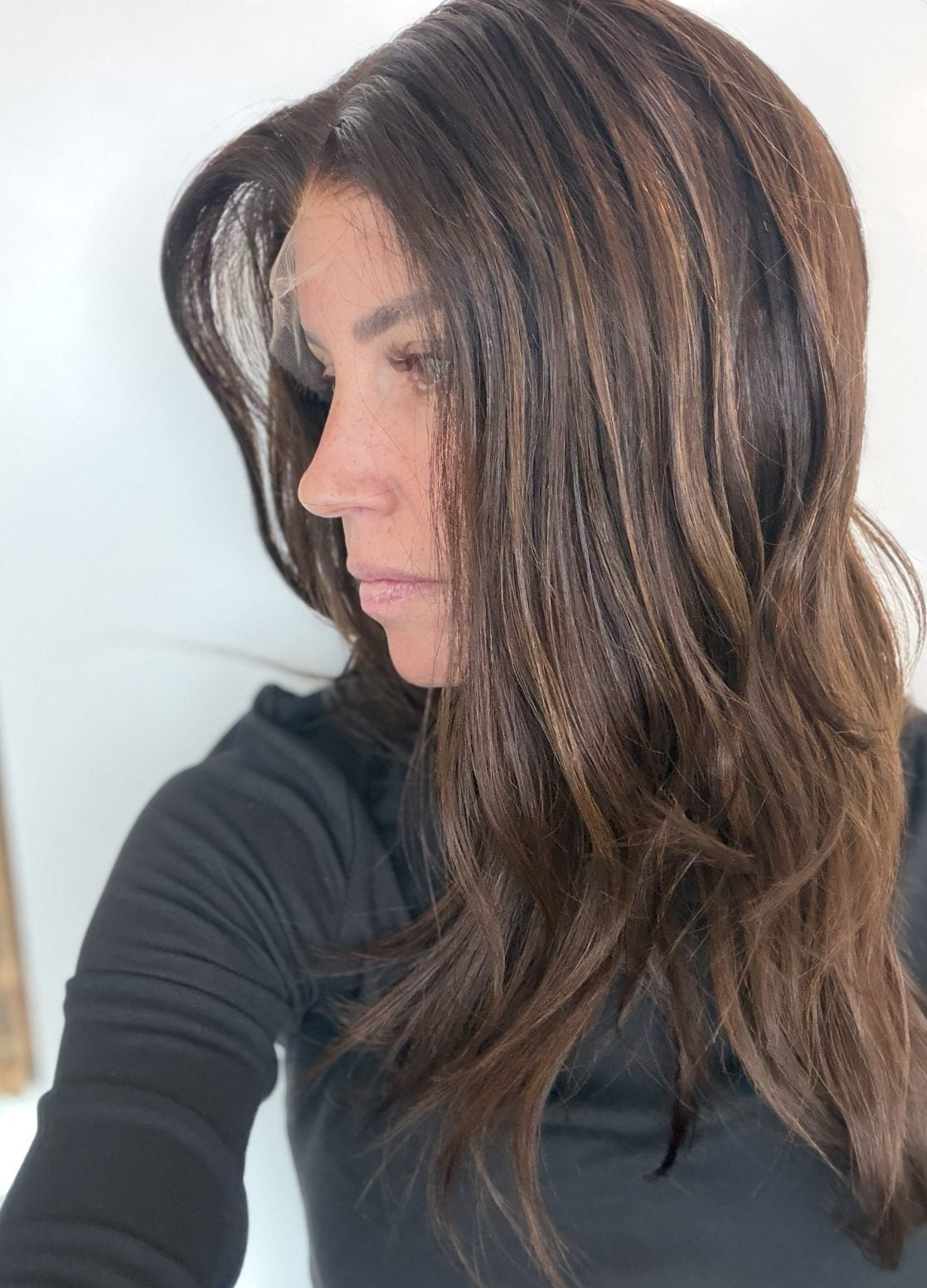 Cinnamon Spice 20-inch wavy wig in warm chocolate brown, side view showing the hairline