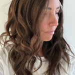 Cinnamon Spice 22-inch wavy wig in warm chocolate brown, side view showing the hairline