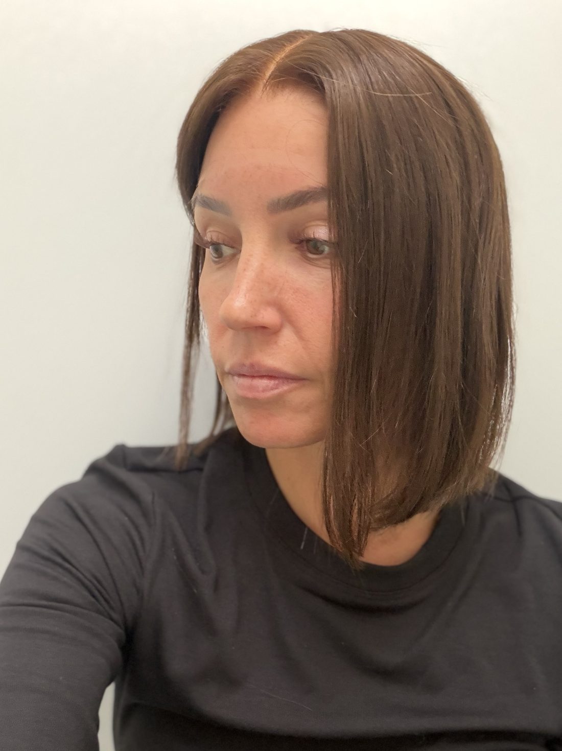 Cocoa 12-inch straight wig in rich medium brown, side view showing the hairline