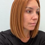 Copper Glow 12-inch straight wig in bright copper red, side view showing the hairline