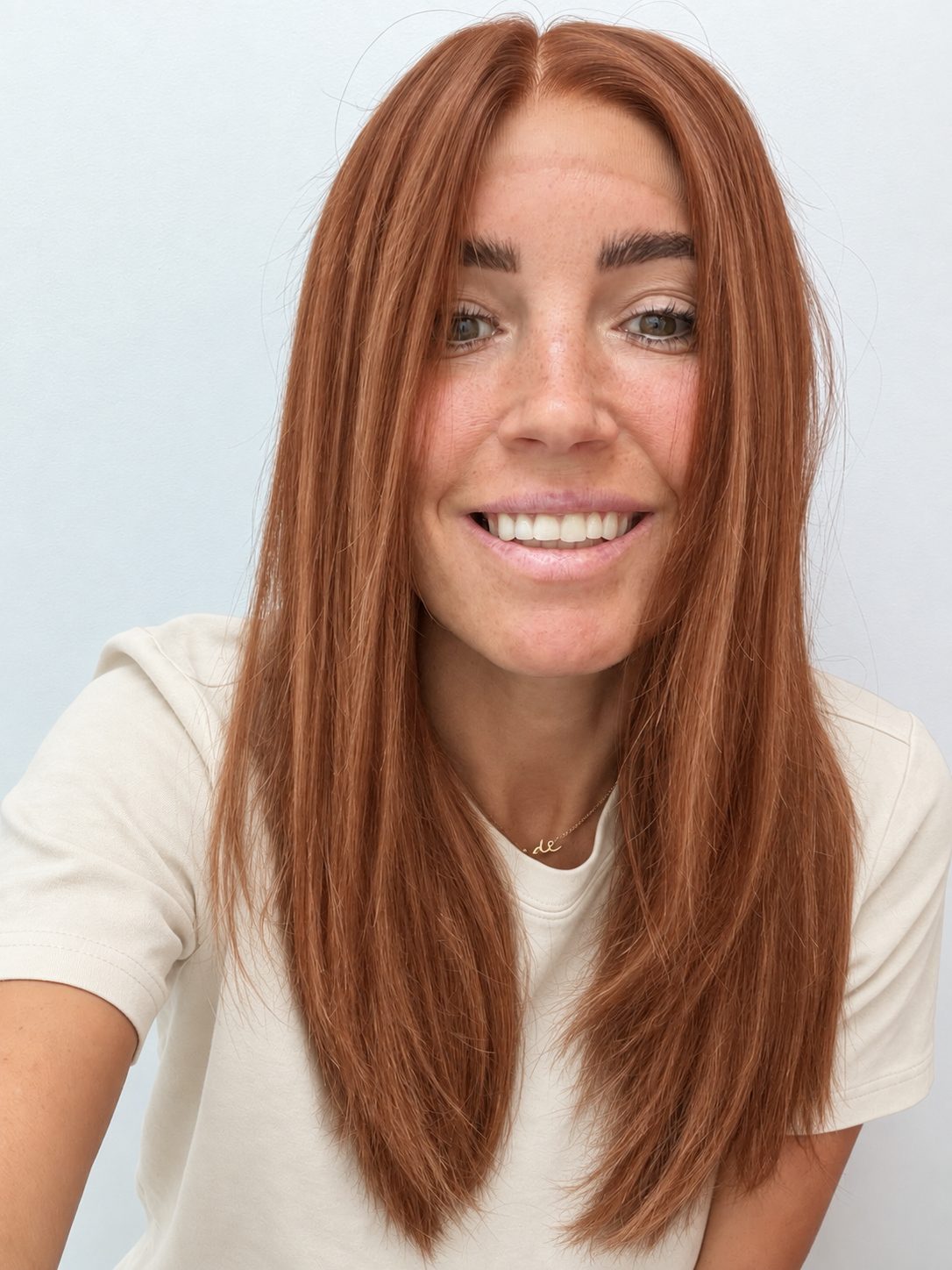 Copper Glow 18-inch layered straight wig in bright copper red, front view