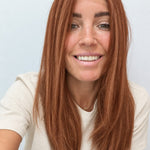 Copper Glow 18-inch layered straight wig in bright copper red, front view