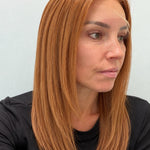 Copper Glow 18-inch straight wig in bright copper red, side view showing the hairline
