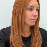 Copper Glow 20-inch straight wig in bright copper red, side view showing the hairline