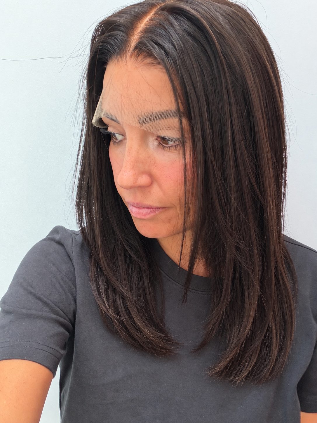 Espresso 14-inch straight wig in dark brown, side view showing the hairline