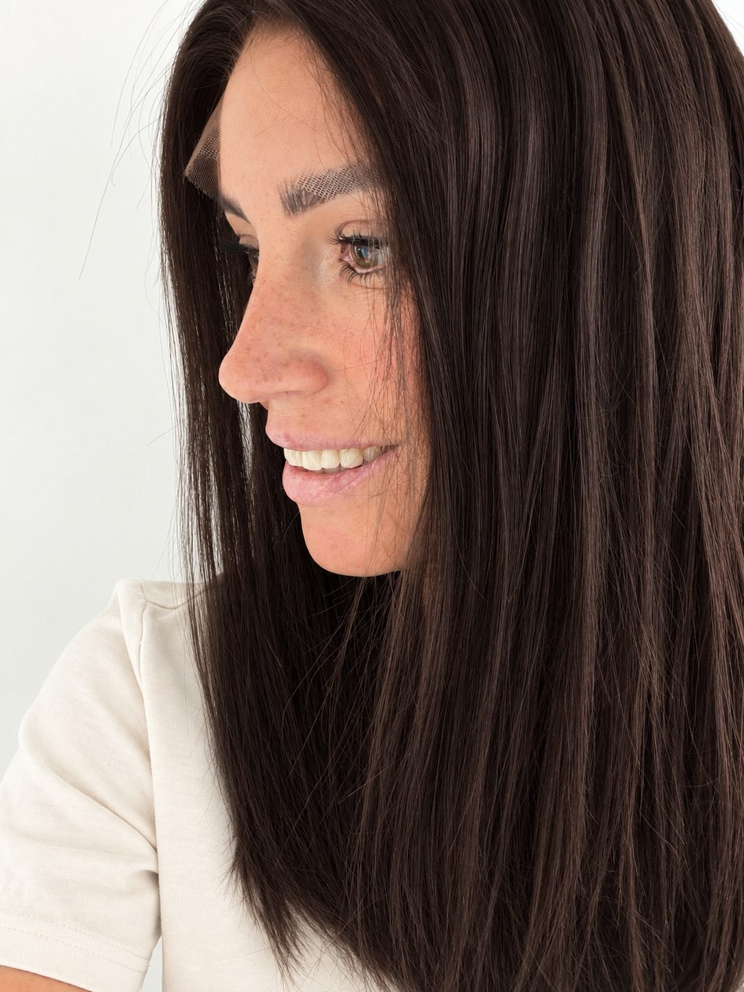 Espresso 16-inch layered straight wig in dark brown, side view showing the hairline