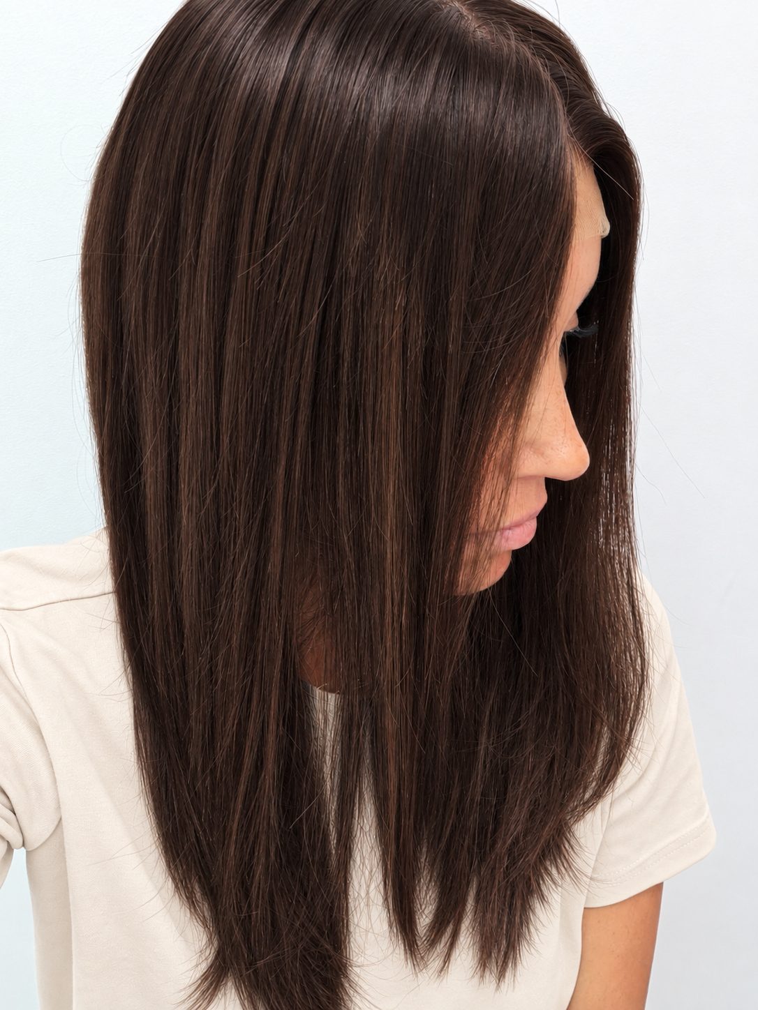 Espresso 18-inch layered straight wig in dark brown, side view showing the hairline