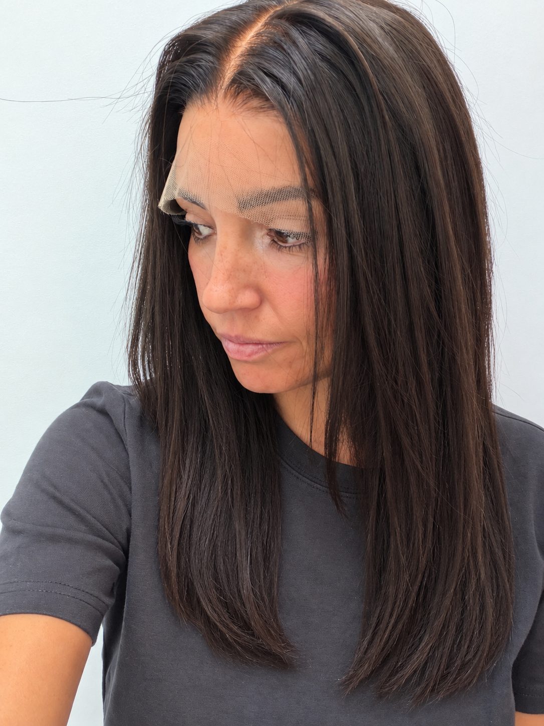 Espresso 18-inch straight wig in dark brown, side view showing the hairline