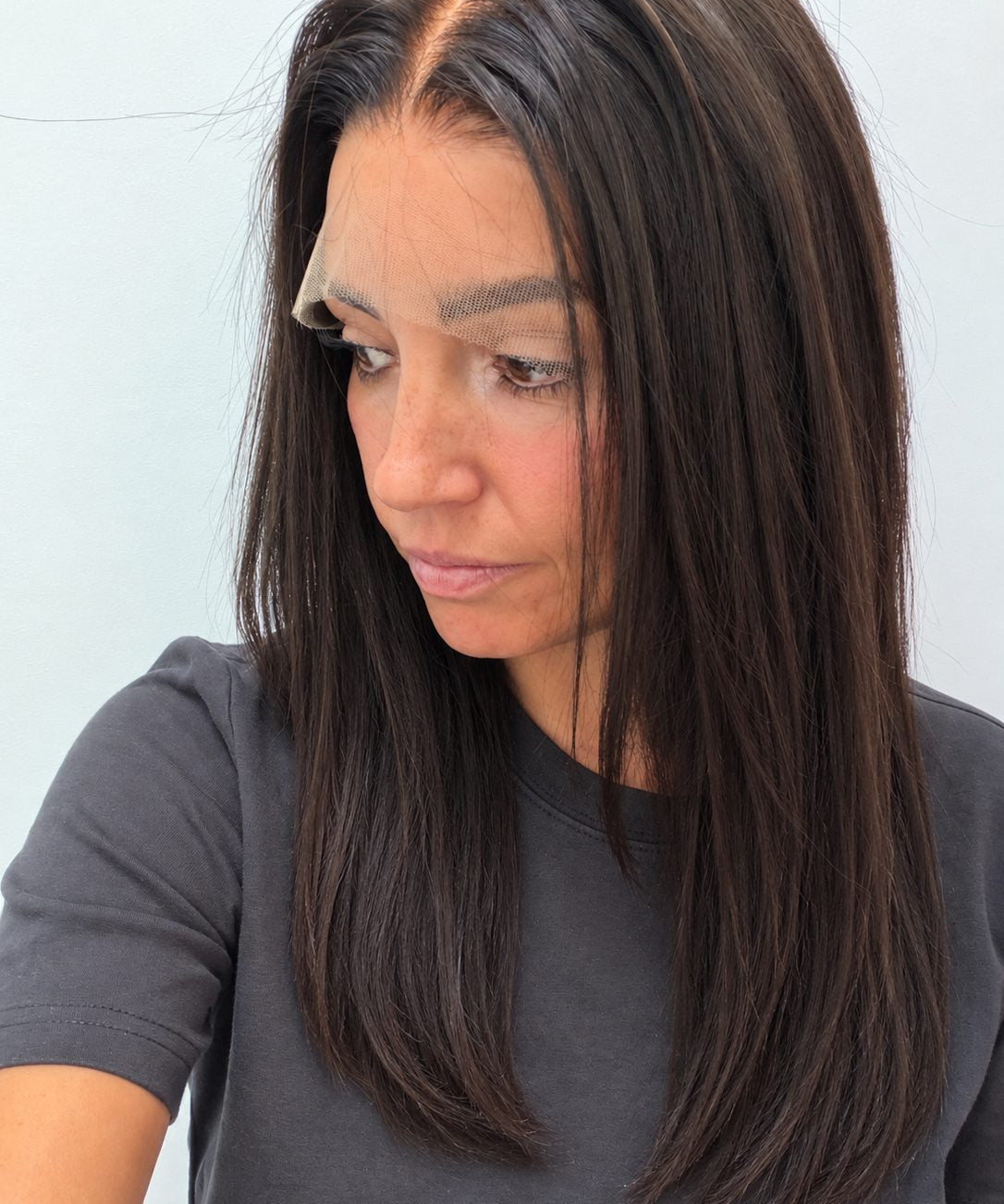 Espresso 20-inch straight wig in dark brown, side view showing the hairline