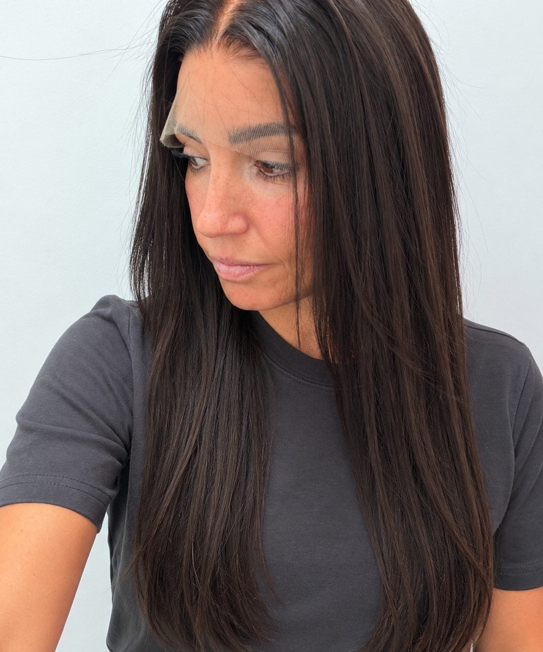 Espresso 24-inch straight wig in dark brown, side view showing the hairline