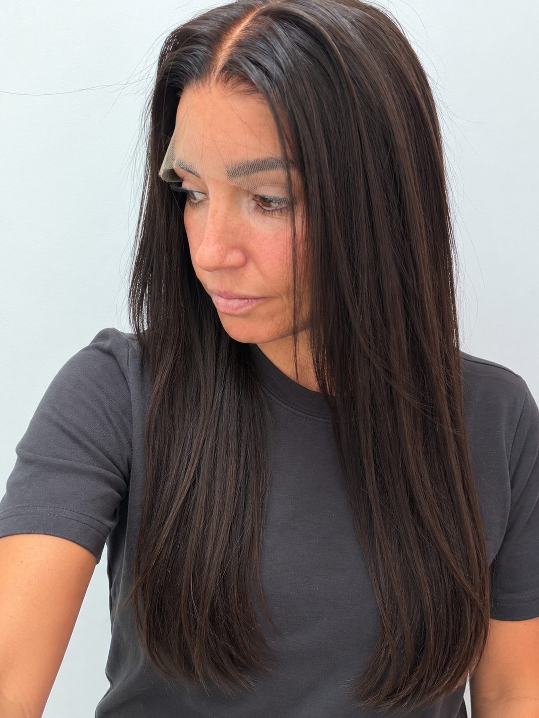 Espresso 24-inch straight wig in dark brown, side view showing the hairline