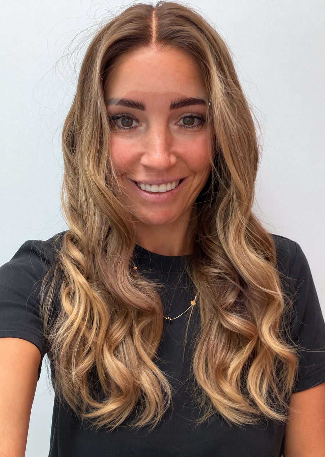 Golden Honey 22-inch wavy wig in golden blonde balayage, front view