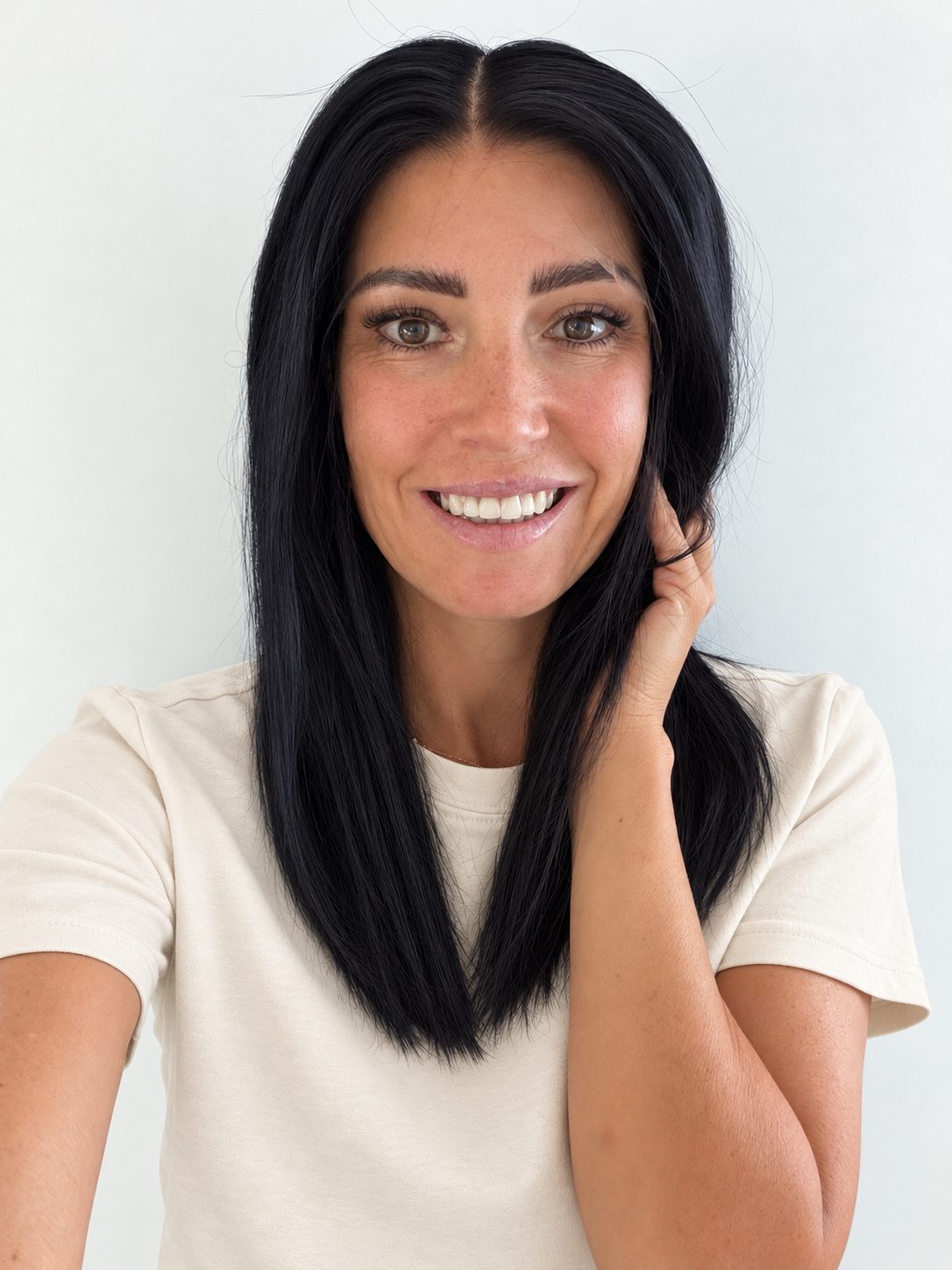 Midnight 16-inch layered straight wig in jet black, front view