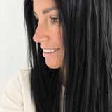 Midnight 16-inch layered straight wig in jet black, side view showing the hairline