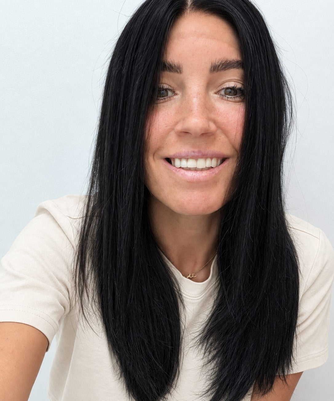 Midnight 18-inch layered straight wig in jet black, front view
