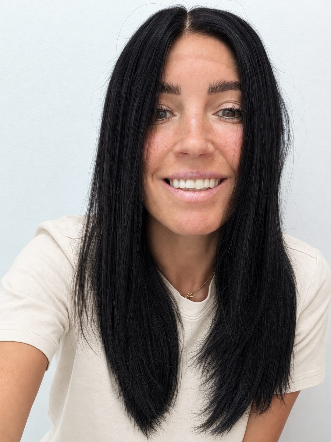 Midnight 18-inch layered straight wig in jet black, front view