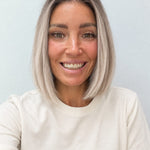 Nordic Pearl 10-inch blunt bob wig in rooted platinum blonde, front view