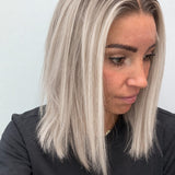 Nordic Pearl 14-inch blunt bob wig in rooted platinum blonde, side view showing the hairline