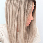 Nordic Pearl 18-inch layered straight wig in rooted platinum blonde, side view showing the hairline