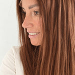 Spiced Auburn 16-inch layered straight wig in warm auburn red, side view showing the hairline