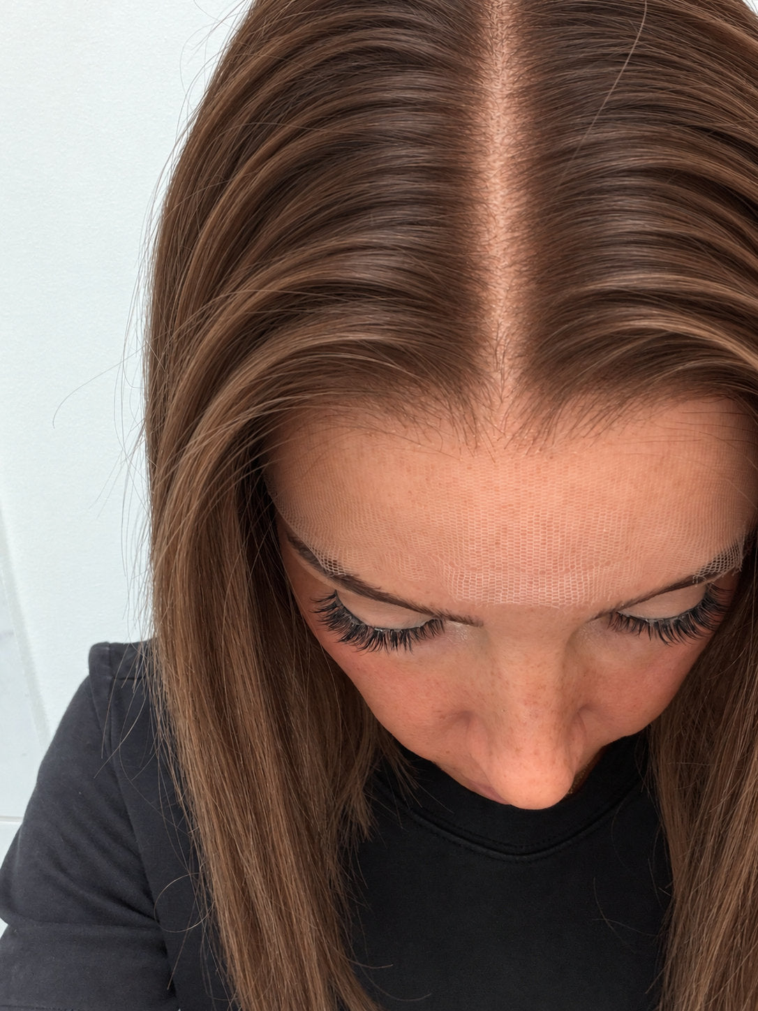 Close-up of the natural lace hairline and parting on a Spiced Red Caramel Balayage human hair wig