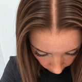 Close-up of the natural lace hairline and parting on a Spiced Red Caramel Balayage human hair wig