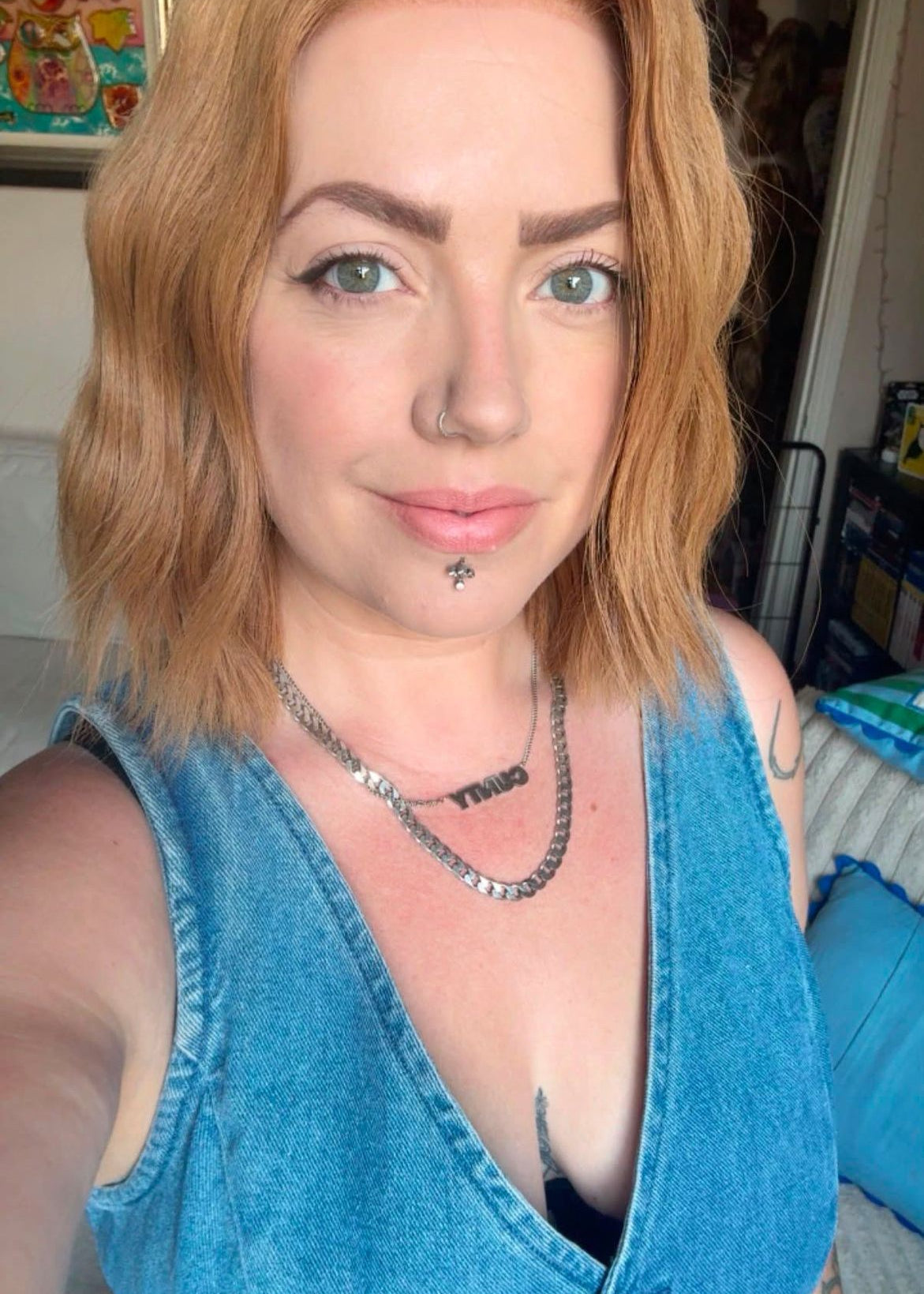 Customer wearing a strawberry blonde wavy bob wig